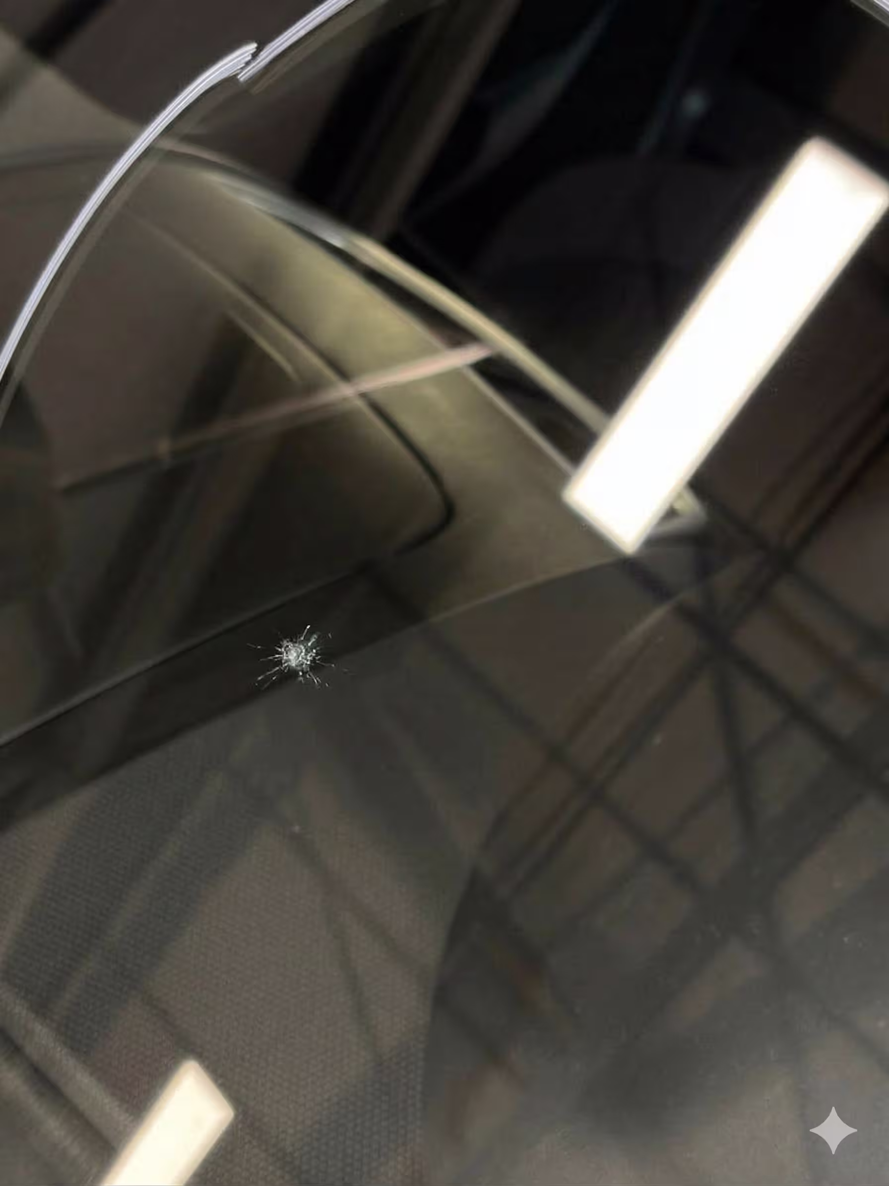 Réparation d'un éclat sur pare-brise à domicile en Suisse Romande